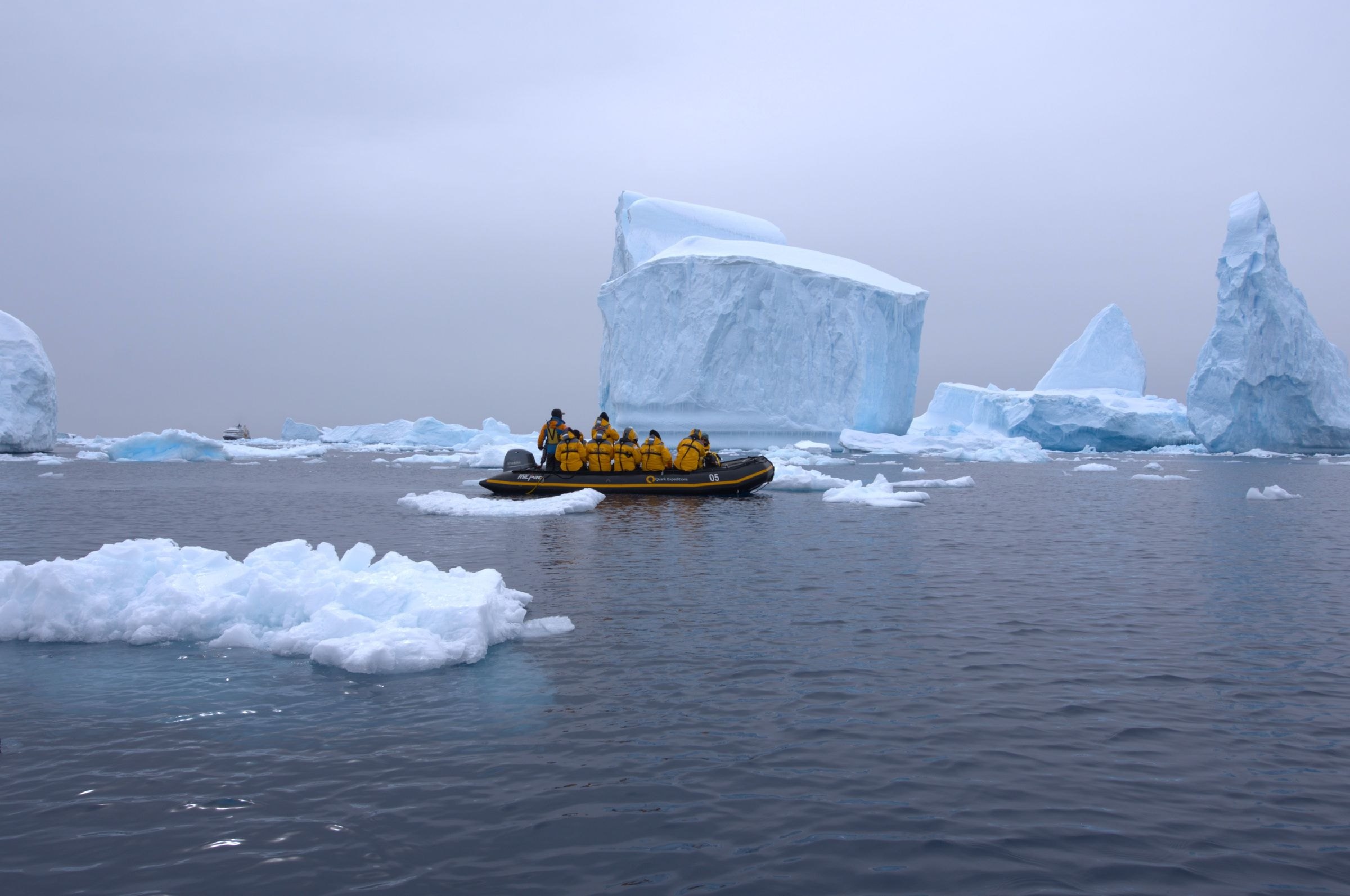 A Zodiac among icebergs